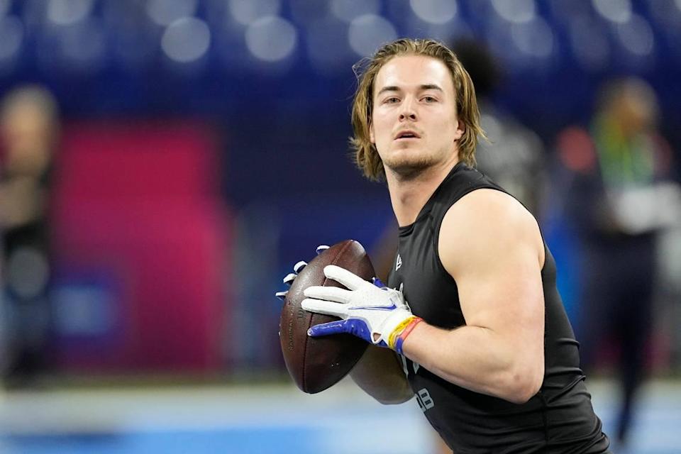 Pittsburgh quarterback Kenny Pickett runs a drill during the NFL football scouting combine, Thursday, March 3, 2022, in Indianapolis. (AP Photo/Darron Cummings)