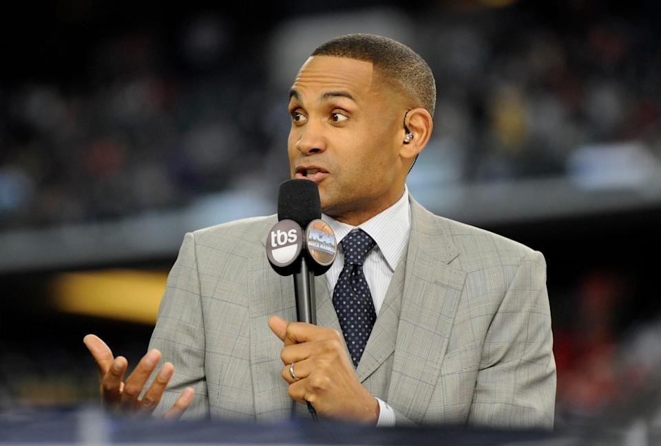 Apr 5, 2014; Arlington, TX, USA; TBS broadcaster Grant Hill on air during the semifinals of the Final Four in the 2014 NCAA Mens Division I Championship tournament between the Florida Gators and Connecticut Huskies at AT&amp;T Stadium. Mandatory Credit: Sean Dougherty-USA TODAY Sports