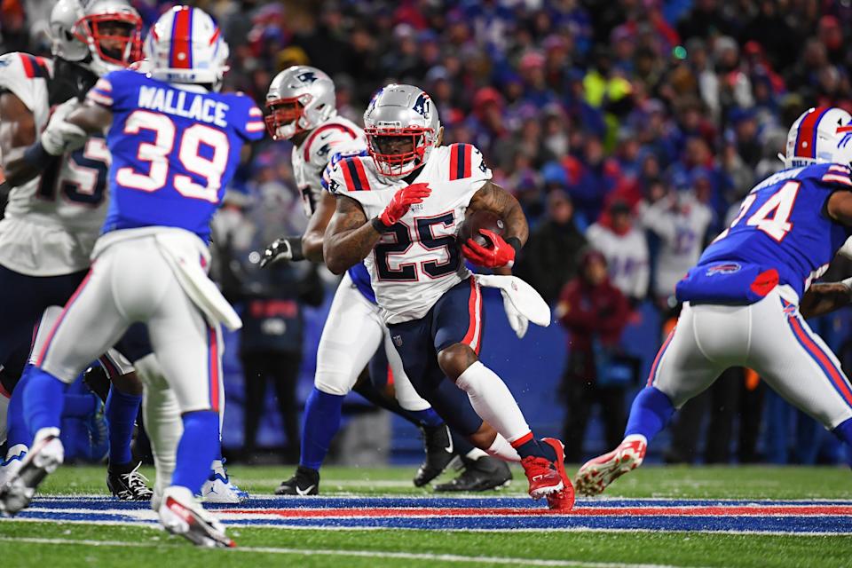 New England Patriots running back Brandon Bolden carries the ball during the first half of a game on Monday, Dec. 6, 2021, at Highmark Stadium in Orchard Park, New York.