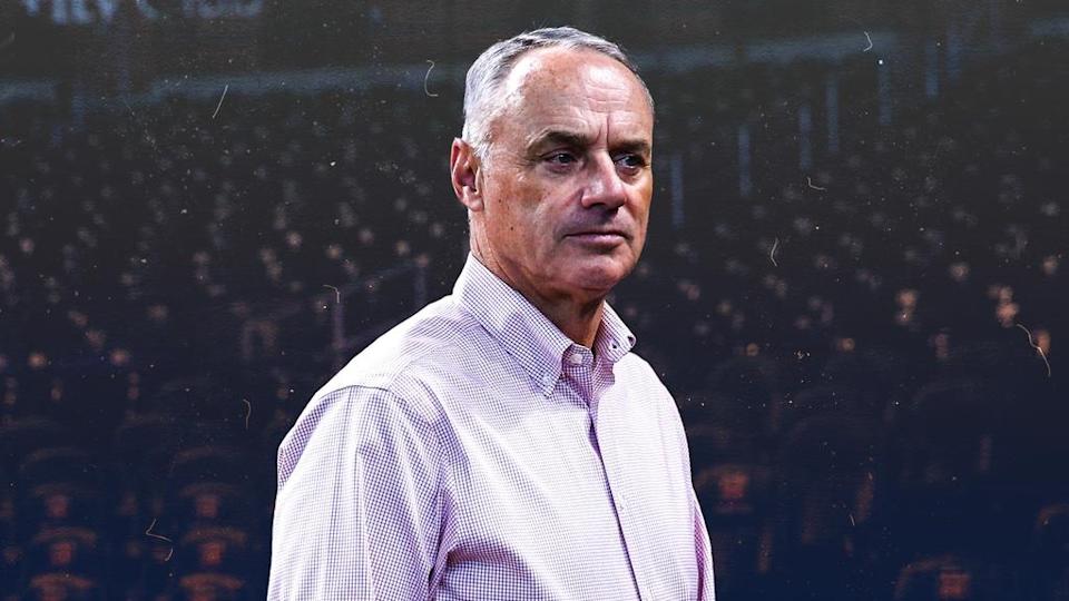 Rob Manfred treated art in front of empty ballpark seats 2022