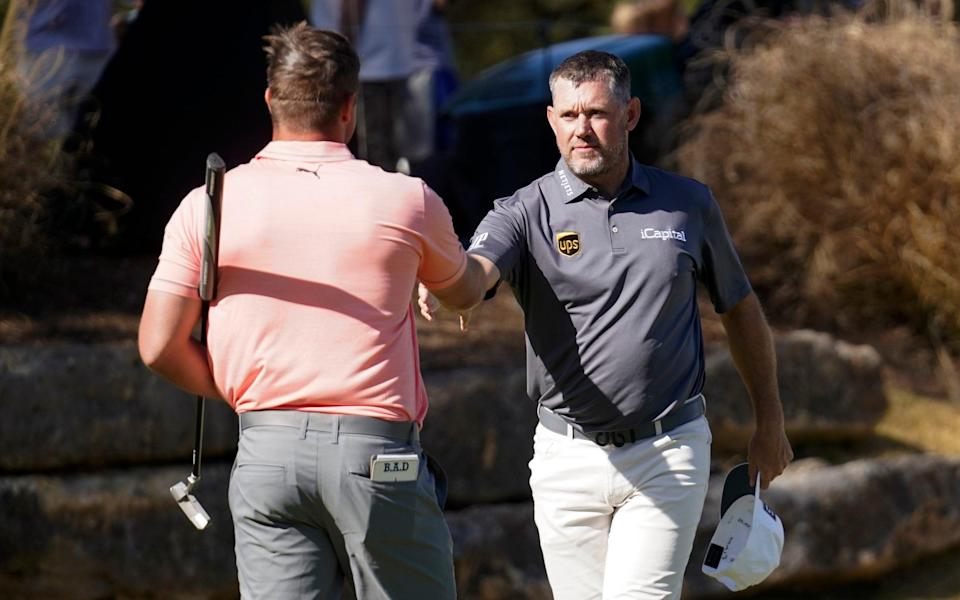 Lee Westwood stands between former junior team-mate Richard Bland and his Masters dream - AP