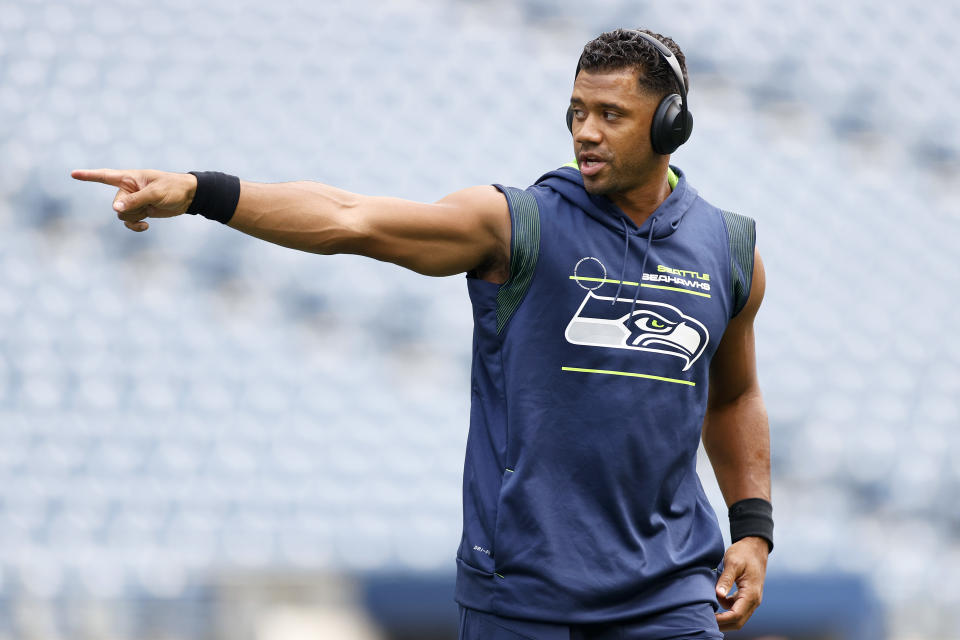 SEATTLE, WASHINGTON - AUGUST 21: Quarterback Russell Wilson #3 of the Seattle Seahawks warms up before an NFL preseason game against the Denver Broncos at Lumen Field on August 21, 2021 in Seattle, Washington. (Photo by Steph Chambers/Getty Images)