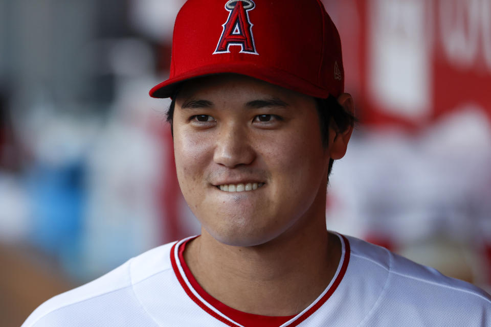 Los Angeles Angels' Shohei Ohtani (17) in the dugout before a baseball game against the Texas Rangers in Anaheim, Calif., Saturday, Sept. 4, 2021. (AP Photo/Ringo H.W. Chiu)