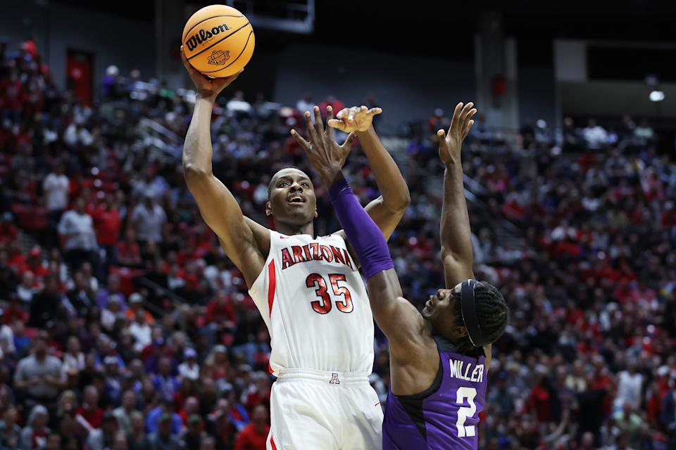 Arizona's Christian Koloko shoots the ball against TCU's Emanuel Miller during their game at the 2022 NCAA men's basketball tournament at San Diego State on March 20, 2022. (Sean M. Haffey/Getty Images)