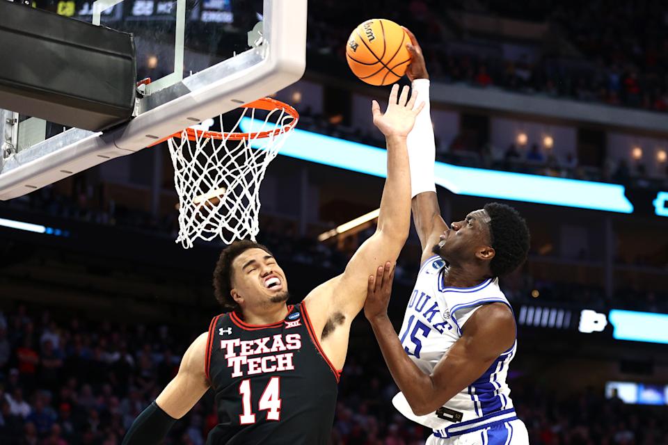 Duke's Mark Williams shoots the ball over Texas Tech's Marcus Santos-Silva during their Sweet 16 game in the 2022 NCAA men's basketball tournament at Chase Center in San Francisco on March 24, 2022. Williams could be a late first-round NBA draft pick. (Ezra Shaw/Getty Images)