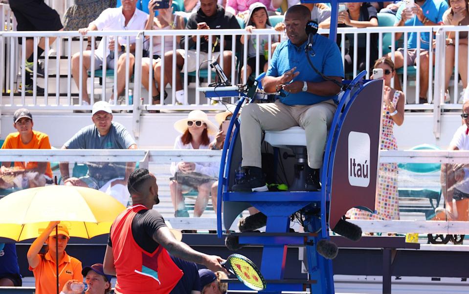 Nick Kyrgios of Australia argues with ATP chair umpire Carlos Bernardes of Brazil during the first set in his match against Jannik Sinner of Italy during the Miami Open at Hard Rock Stadium on March 29, 2022 in Miami Gardens, Florida. - GETTY IMAGES