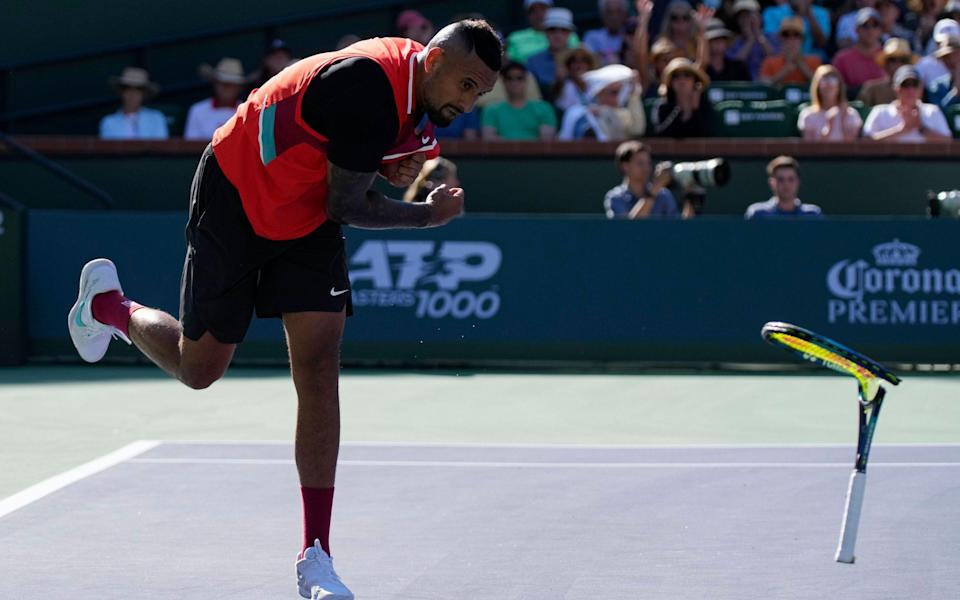 Mandatory Credit: Photo by RAY ACEVEDO/EPA-EFE/Shutterstock (12854129ci) Nick Kyrgios of Australia smashes his racket to the court in the first set against Rafael Nadal of Spain during the BNP Paribas Open tennis tournament at the Indian Wells Tennis Garden in Indian Wells, California, USA, 17 March 2022. Kyrgios received a code violation for this act from the Chair Umpire. BNP Paribas Open tennis tournament, Indian Wells, USA - 17 Mar 2022 - RAY ACEVEDO/EPA-EFE/Shutterstock 