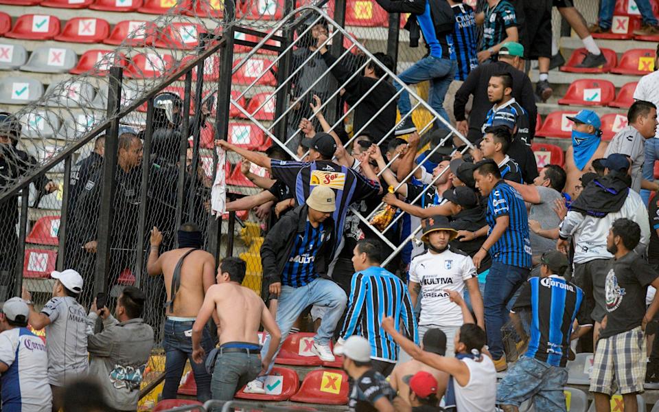 A metal gate is used in the stands - AP