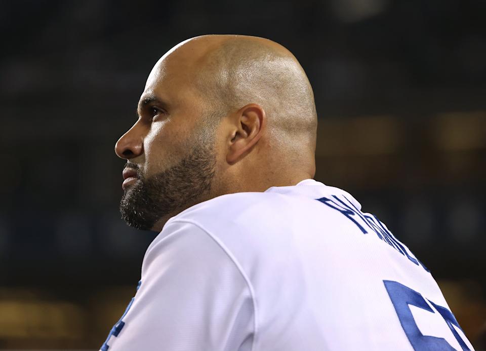 LOS ANGELES, CALIFORNIA - OCTOBER 21: Albert Pujols #55 of the Los Angeles Dodgers looks on to the field during an 11-2 win over the Atlanta Braves during game five of the National League Championship Series at Dodger Stadium on October 21, 2021 in Los Angeles, California. (Photo by Harry How/Getty Images)