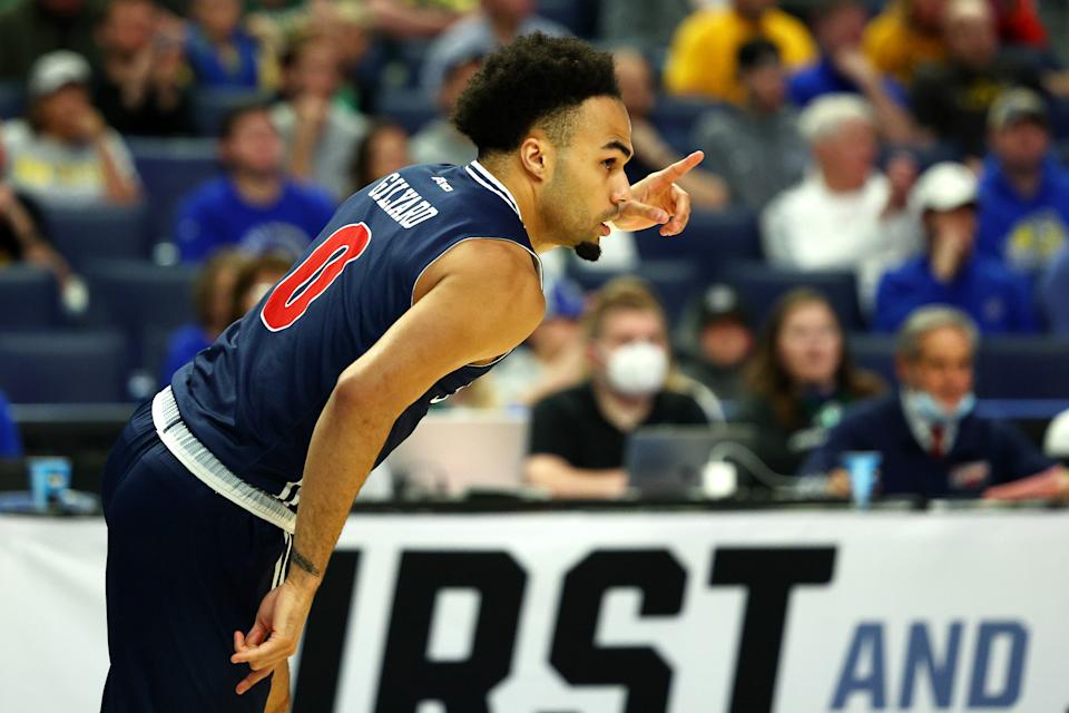 BUFFALO, NEW YORK - MARCH 17: Jacob Gilyard #0 of the Richmond Spiders celebrates a basket during the first half against the Iowa Hawkeyes in the first round game of the 2022 NCAA Men's Basketball Tournament at KeyBank Center on March 17, 2022 in Buffalo, New York. (Photo by Elsa/Getty Images)