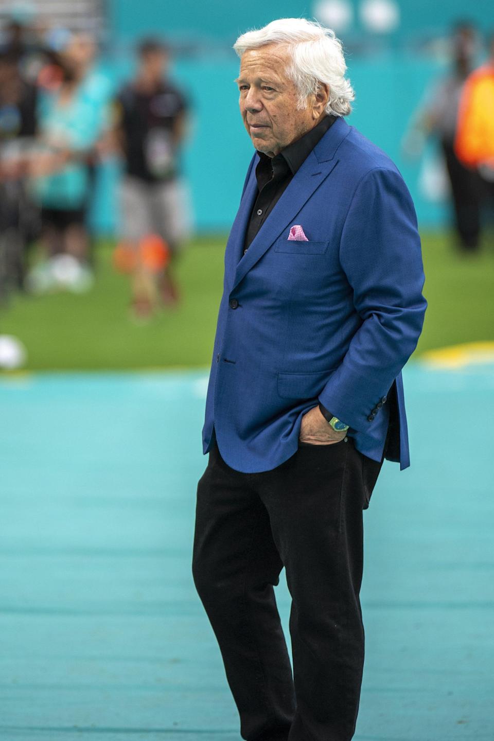 New England Patriots owner Robert Kraft stands on the sidelines before an NFL football game against the Miami Dolphins, Sunday, Jan. 9, 2022, in Miami Gardens, Fla. (AP Photo/Doug Murray)