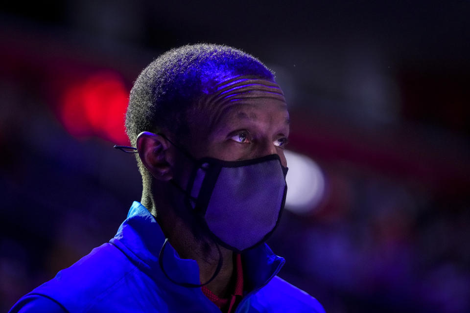 Detroit Pistons head coach Dwane Casey looks on before a game.