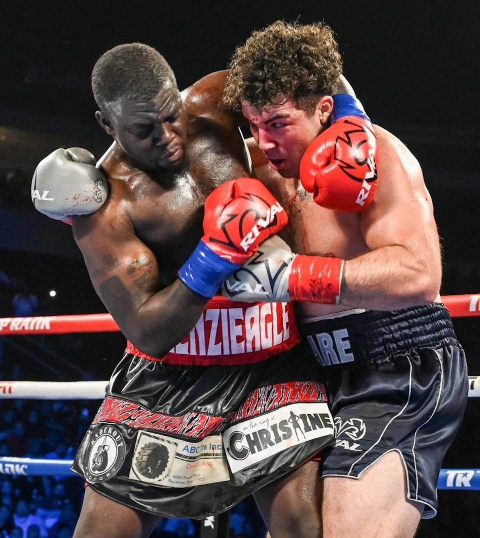 Richard Torrez Jr, right, tangles with opponent Allen Melson during their fight at the Save Mart Center on Friday, March 4, 2022.