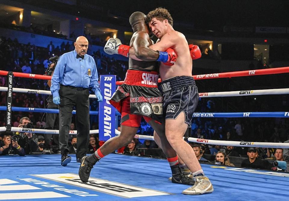 Richard Torrez Jr, right, collides with opponent Allen Melson during their fight at the Save Mart Center on Friday, March 4, 2022.