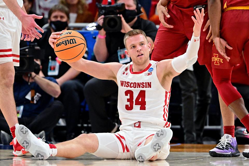 Wisconsin and Brad Davison (34) lost to Iowa State, one of the Big Ten's March Madness disappointments. (Photo by Ben Solomon/NCAA Photos via Getty Images)