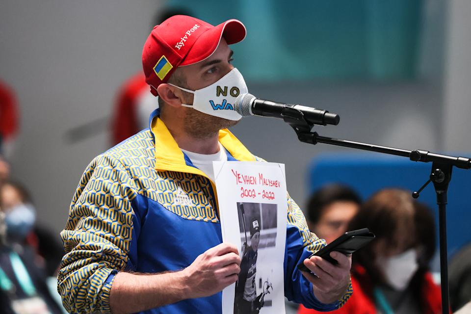 BEIJING, CHINA - MARCH 2, 2022: A Kyiv Post journalist holds a sign reading 