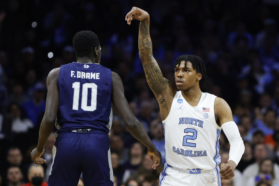 PHILADELPHIA, PENNSYLVANIA - MARCH 27: Caleb Love #2 of the North Carolina Tar Heels reacts during the first half of the game against the North Carolina Tar Heels in the Elite Eight round game of the 2022 NCAA Men's Basketball Tournament at Wells Fargo Center on March 27, 2022 in Philadelphia, Pennsylvania. (Photo by Tim Nwachukwu/Getty Images)