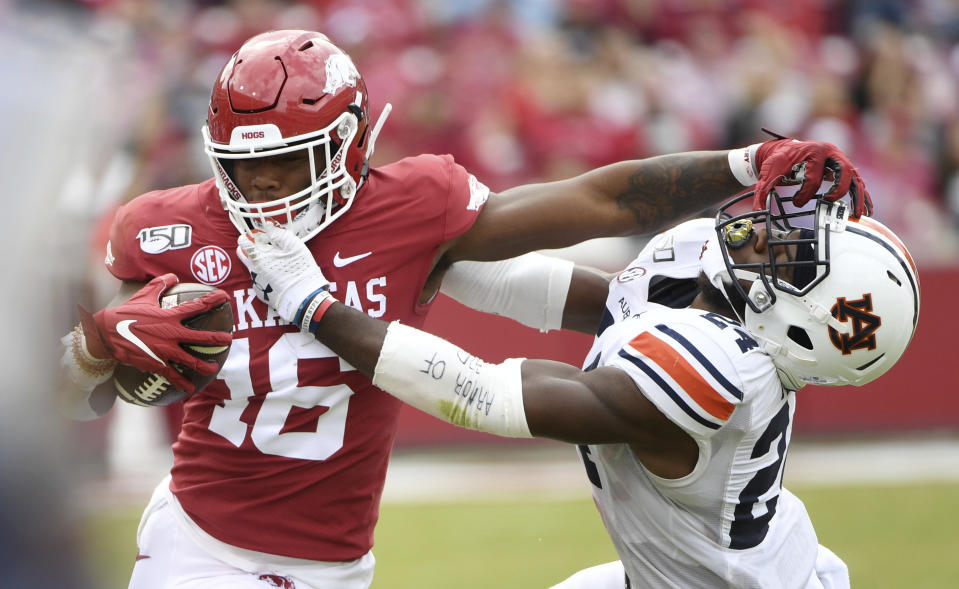 Arkansas receiver Treylon Burks used his giant hands and dynamic athleticism to turn in three impressive college seasons. (AP Photo/Michael Woods)