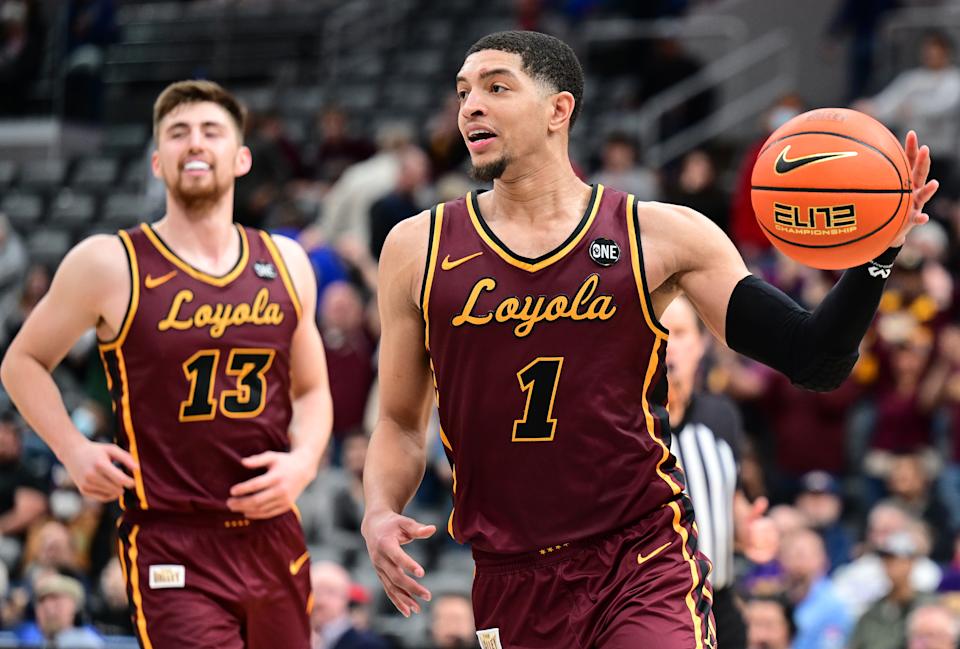 ST. LOUIS, MO - MARCH 06: Loyola Chicago Ramblers forward Ryan Schwieger (13) and Loyola Chicago Ramblers guard Lucas Williamson (1) celebrate winning the championship game of the Missouri Valley Conference between the Loyola Chicago Ramblers and the Drake Bulldogs on March 06, 2022, at Enterprise Center, St. Louis , MO. (Photo by Keith Gillett/Icon Sportswire via Getty Images),