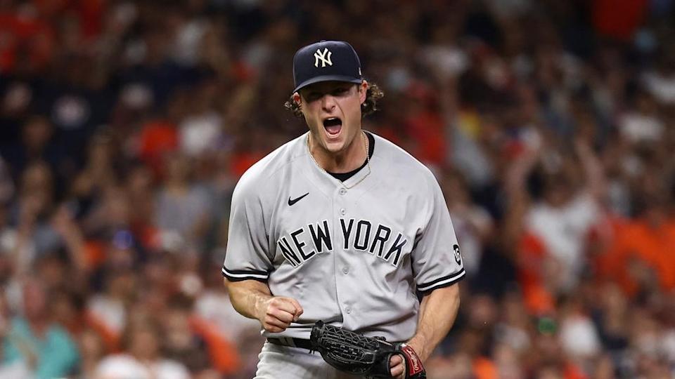 Jul 10, 2021; Houston, Texas, USA; New York Yankees starting pitcher Gerrit Cole (45) reacts after recording a strikeout against the Houston Astros to end the game at Minute Maid Park. Mandatory Credit: Troy Taormina-USA TODAY Sports
