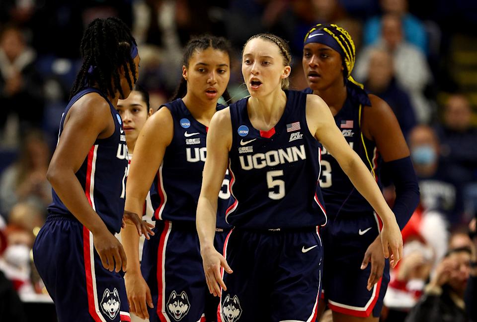 UConn's Paige Bueckers, center, is one of the main reasons why the Huskies are back in the Final Four. (Elsa/Getty Images)