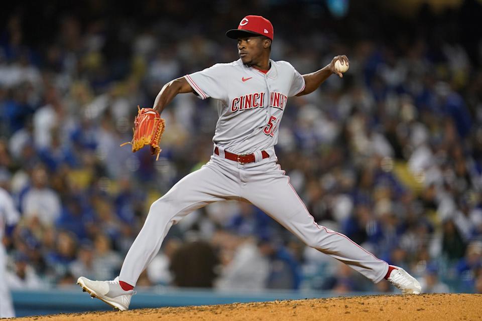 Cincinnati Reds relief pitcher Reiver Sanmartin (52) throws during the third inning of a baseball game against the Los Angeles Dodgers in Los Angeles, Thursday, April 14, 2022.