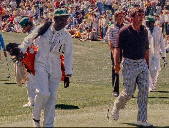 Defending champion Fuzzy Zoeller and caddie Jariah &quot;Jerry' Beard walk onto a green at Augusta National during the 1980 Masters.