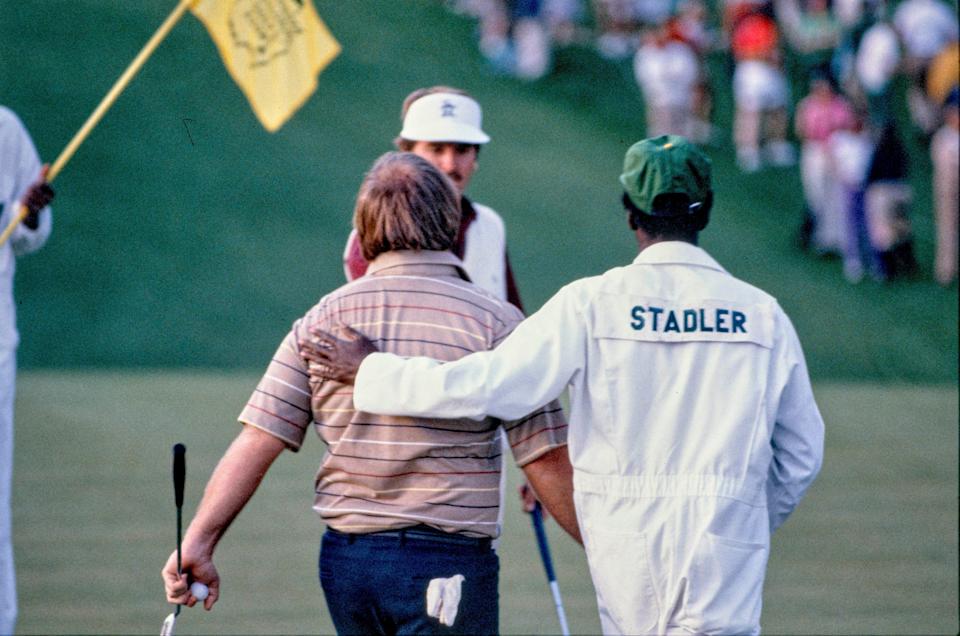 Caddie Ben Bussey with his arm around Craig Stadler after his first playoff hole victory to win the 1982 Masters.