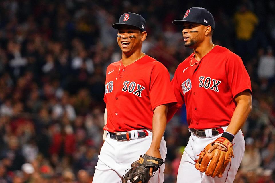 Third baseman Rafael Devers, left, and shortstop Xander Bogaerts have both received contract offers from the Red Sox but both are said to be considerably below market value.