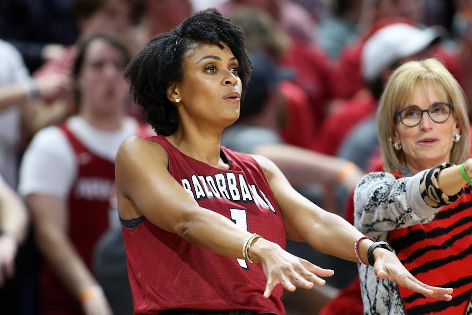 Feb 5, 2022; Fayetteville, Arkansas, USA; Danyelle Sargent Musselman, wife of Arkansas Razorbacks head coach Eric Musselman (not pictured) &quot;calls the Hogs&quot; during the second half against the Mississippi State Bulldogs at Bud Walton Arena. Arkansas won 63-55. Mandatory Credit: Nelson Chenault-USA TODAY Sports