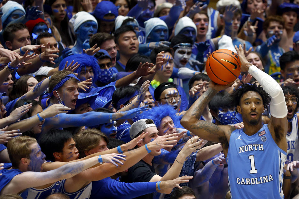 North Carolina's Leaky Black looks to pass as Duke fans react during the second half of a game on March 5. (Jared C. Tilton/Getty Images)