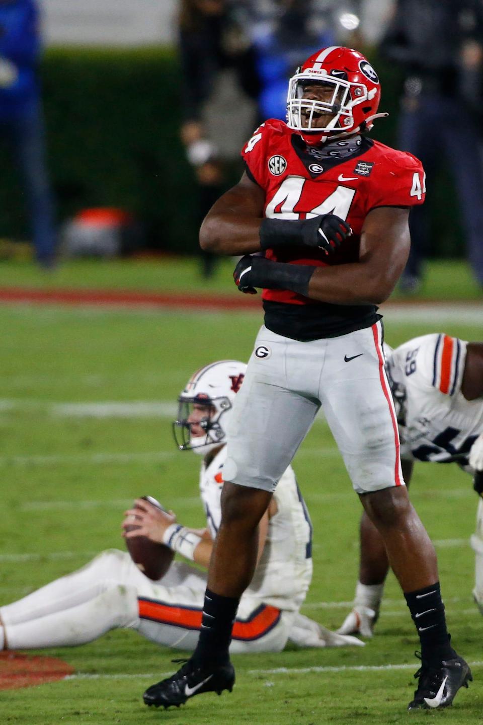 Georgia defensive lineman Travon Walker (44) celebrates a sack against Auburn.