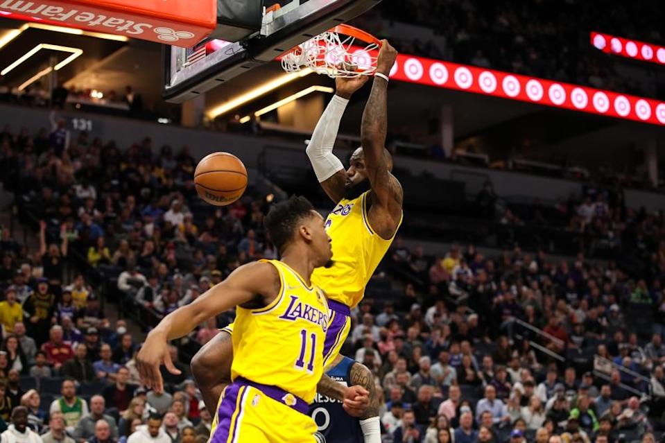 LeBron James dunks the ball