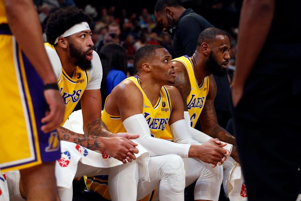 Most of the Lakers' salary cap next season will be tied up in Anthony Davis (left), Russell Westbrook (center) and LeBron James (right).