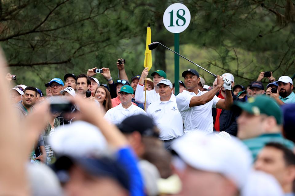 AUGUSTA, GEORGIA - APRIL 06: Tiger Woods of the United States plays his shot from the 18th tee during a practice round prior to the Masters at Augusta National Golf Club on April 06, 2022 in Augusta, Georgia. (Photo by David Cannon/Getty Images)