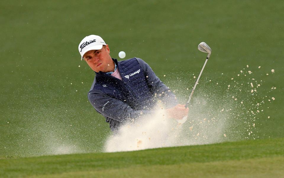 Justin Thomas plays out of a bunker on the 2nd - REUTERS/Brian Snyder