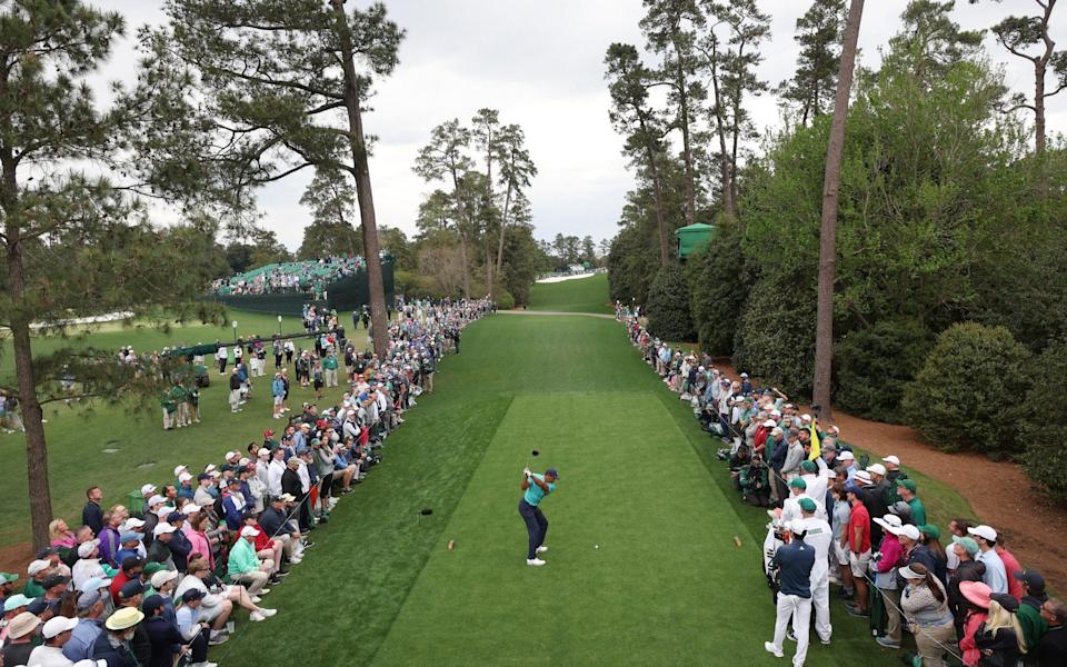 Tiger Woods plays his shot from the 18th tee during the second round - Jamie Squire/Getty Images