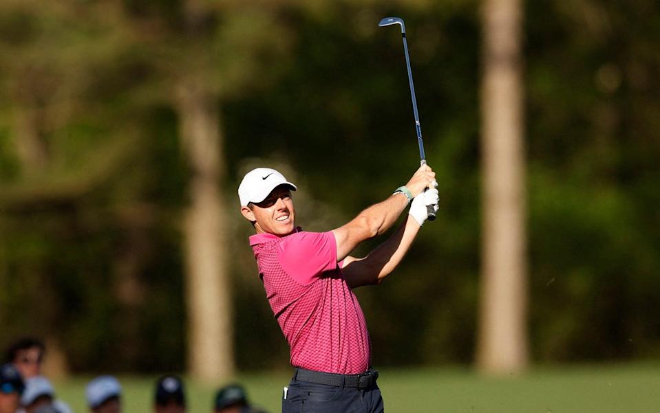 Rory McIlroy tees off on the 12th on day two  - REUTERS/Jonathan Ernst