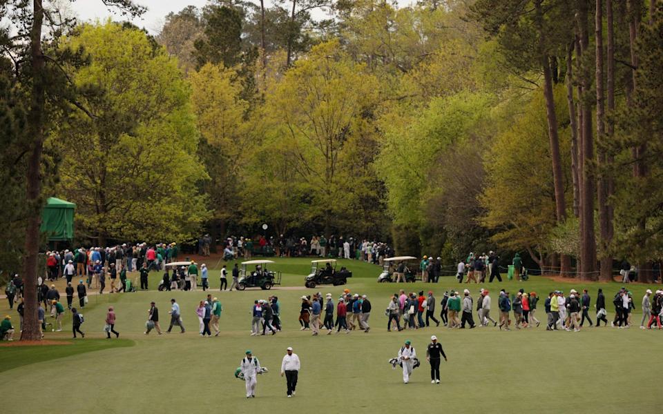 Ireland's Shane Lowry and South Korea's Sungjae Im walk down the 7th fairway during the third round - REUTERS/Brian Snyder