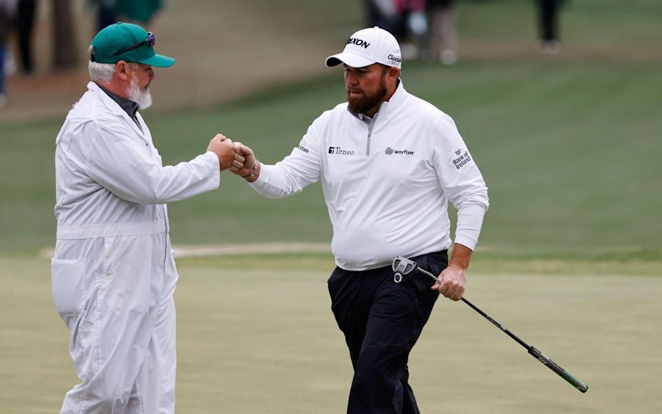 Shane Lowry of Ireland celebrates with his caddie on the 6th - ERIK S LESSER/EPA-EFE/Shutterstock