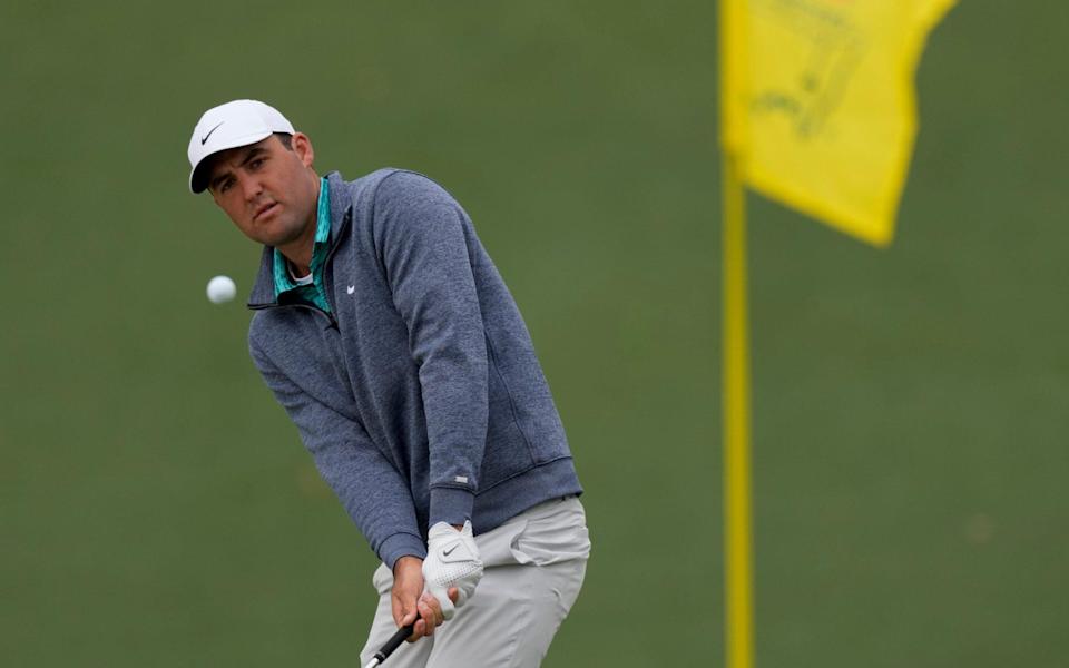 Scottie Scheffler chips to the 2nd hole during the third round at the Masters - AP Photo/Matt Slocum