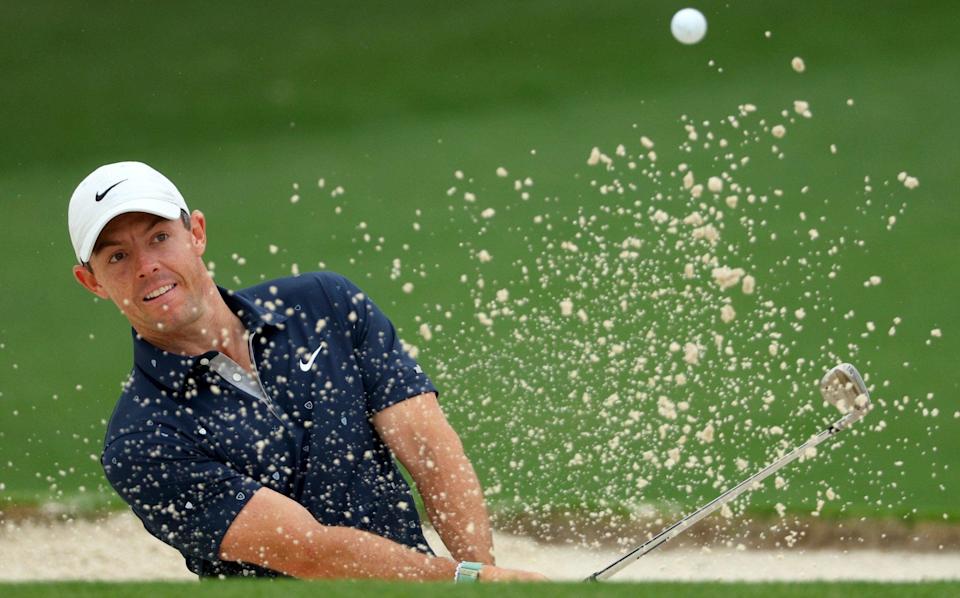 APRIL 06: Rory McIlroy of Northern Ireland plays a shot from a bunker on the second hole during a practice round prior to the Masters at Augusta National Golf Club on April 06, 2022 in Augusta, Georgia - GETTY IMAGES