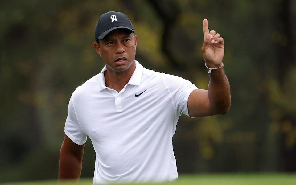  Tiger Woods of the United States gestures during a practice round prior to the Masters at Augusta National Golf Club on April 06, 2022 in Augusta, Georgia - - GETTY IMAGES