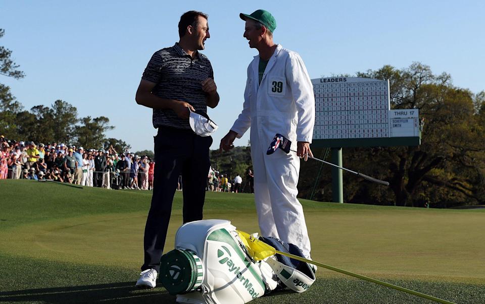 Scheffler and Scott congratulate each other after their win - GETTY IMAGES