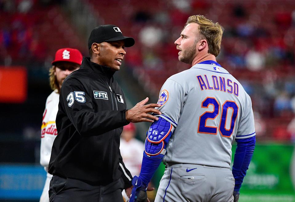 New York Mets designated hitter Pete Alonso reacts after he was hit in the head by a pitch from St. Louis Cardinals reliever Kodi Whitley during the eighth inning at Busch Stadium.