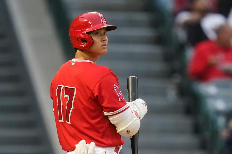 The Angels' Shohei Ohtani stands at home plate before batting during a spring training game against the Dodgers on Sunday night in Anaheim.