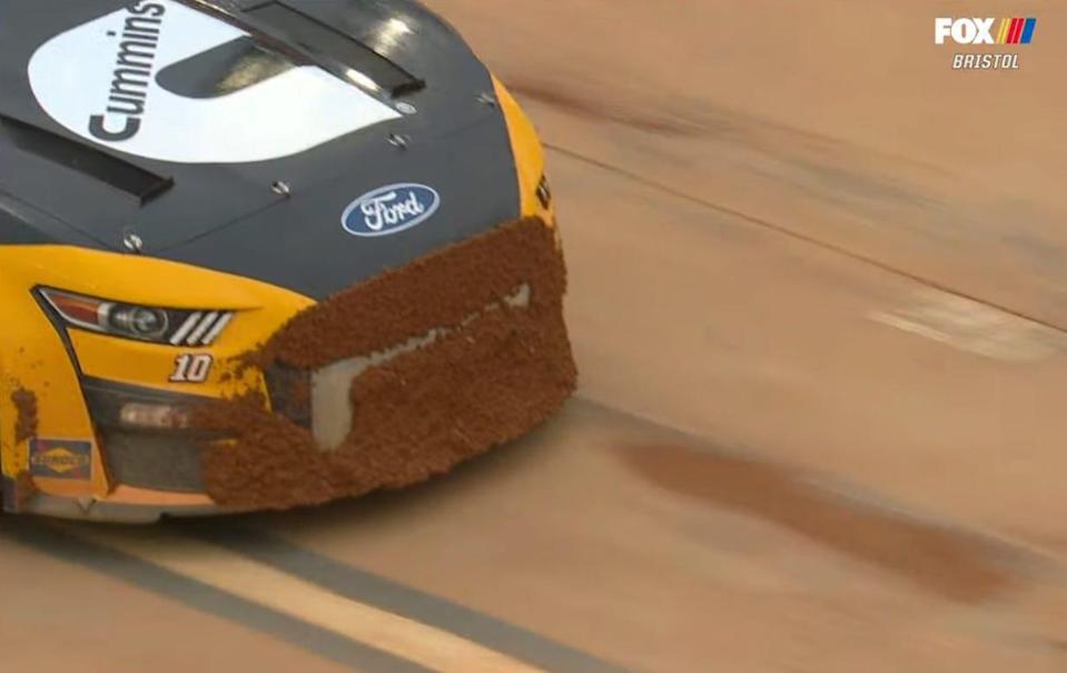 Dirt covering the grill of a NASCAR car