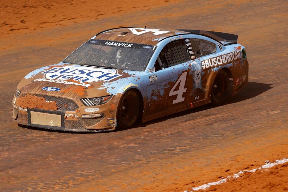 Kevin Harkvick's NASCAR car is covered in mud