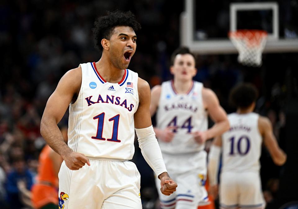 Kansas guard Remy Martin (11) reacts after a play during the Jayhawks' win against the Miami Hurricanes in the Elite Eight. Kansas plays Villanova in the first game of the 2022 Final Four.