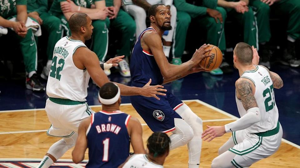 Nets Kevin Durant goes up for shot against Celtics Game 4